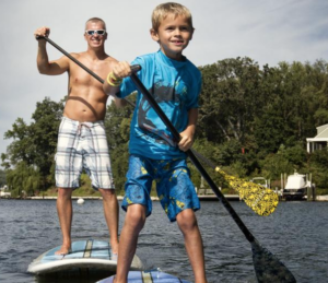 paddleboarding kid